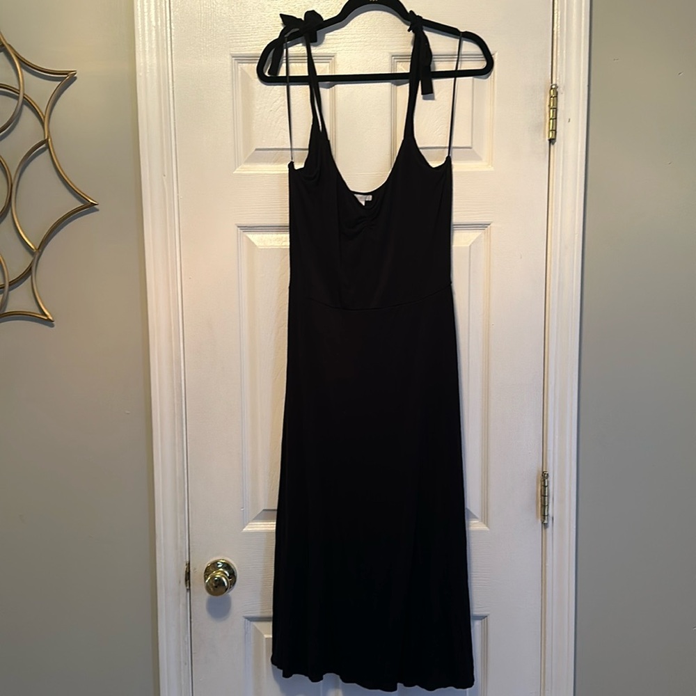 Black A Line Dress. Size medium. With adjustable tie straps. Very stretchy.